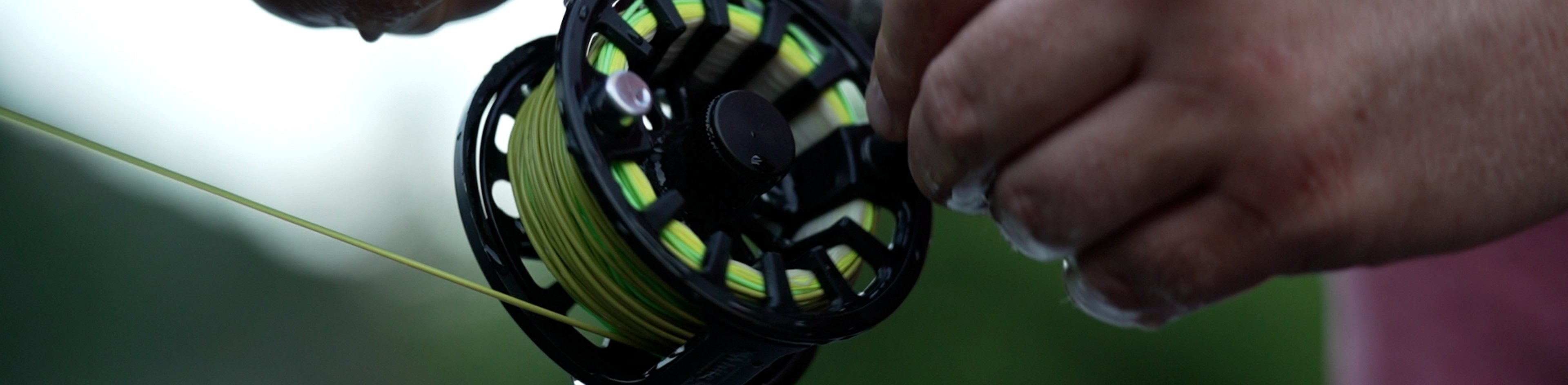 Close up shot of a fly-fishing reel